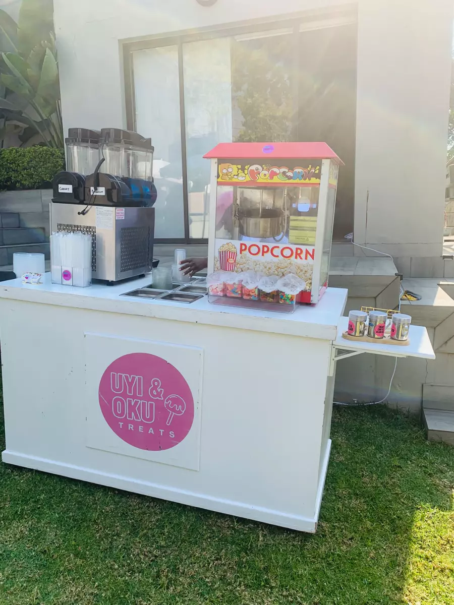 Slush machine and popcorn machine set up on the counter