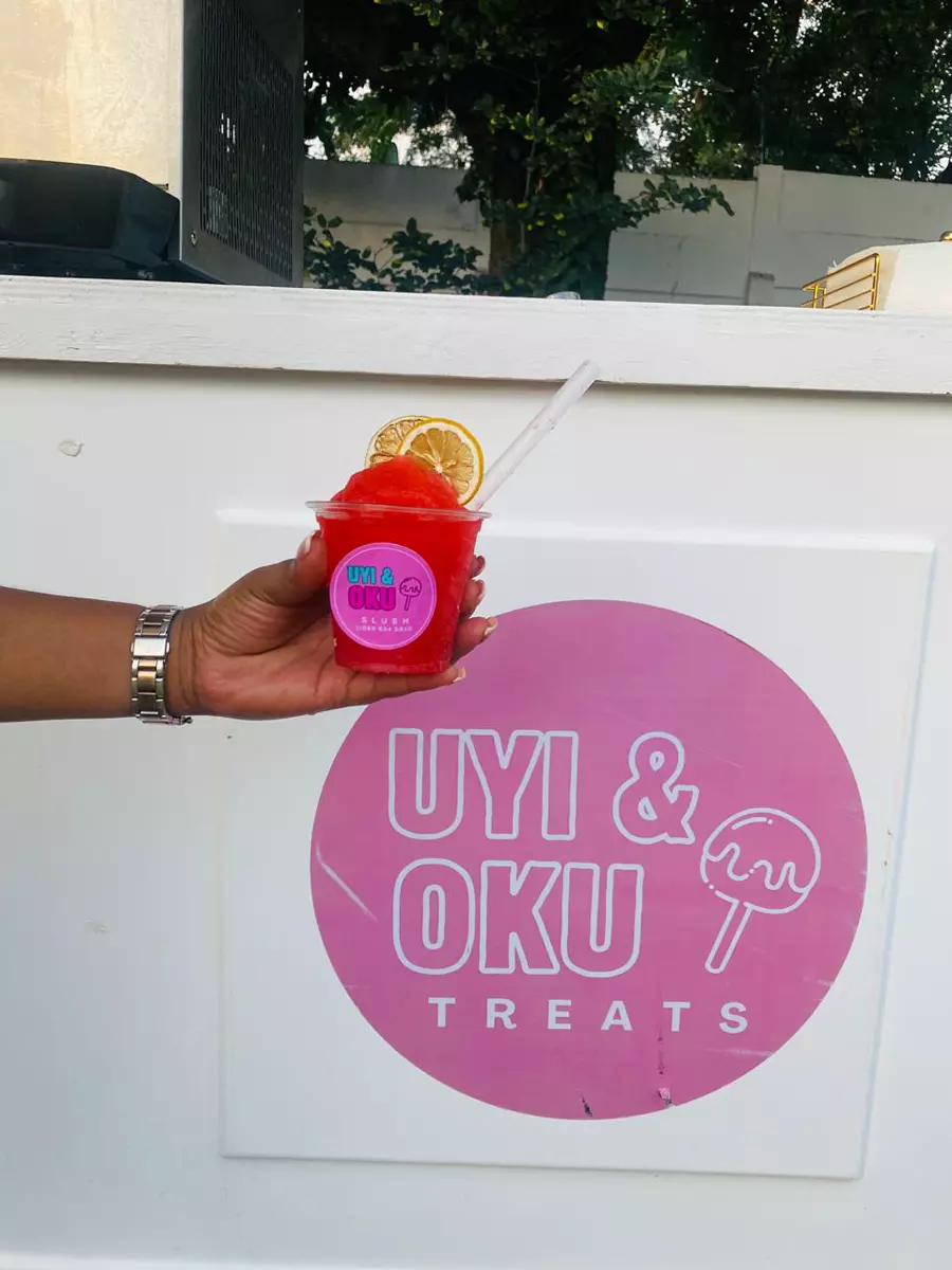 Red slush in front of the Uyi and Oku Treats cart
